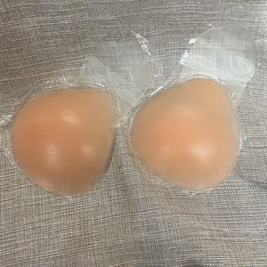 Breast enhancers